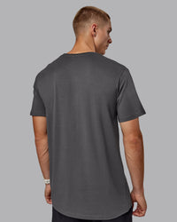Man wearing Base FLXCotton Tee - Dark Storm | Thumbnail Index: 3