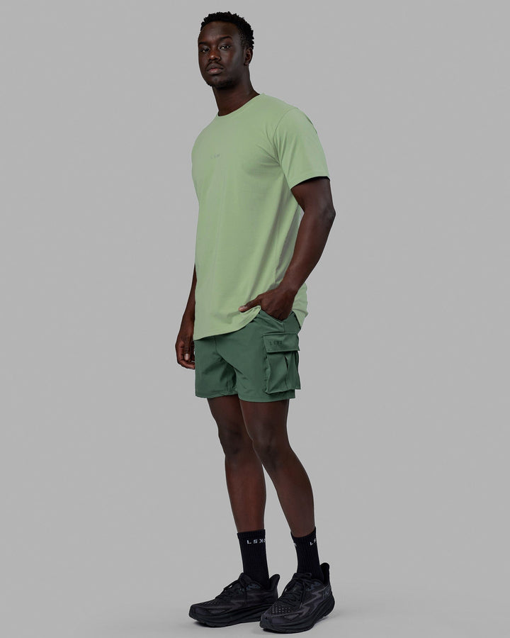 Man wearing Base FLXCotton Tee - Green Fig