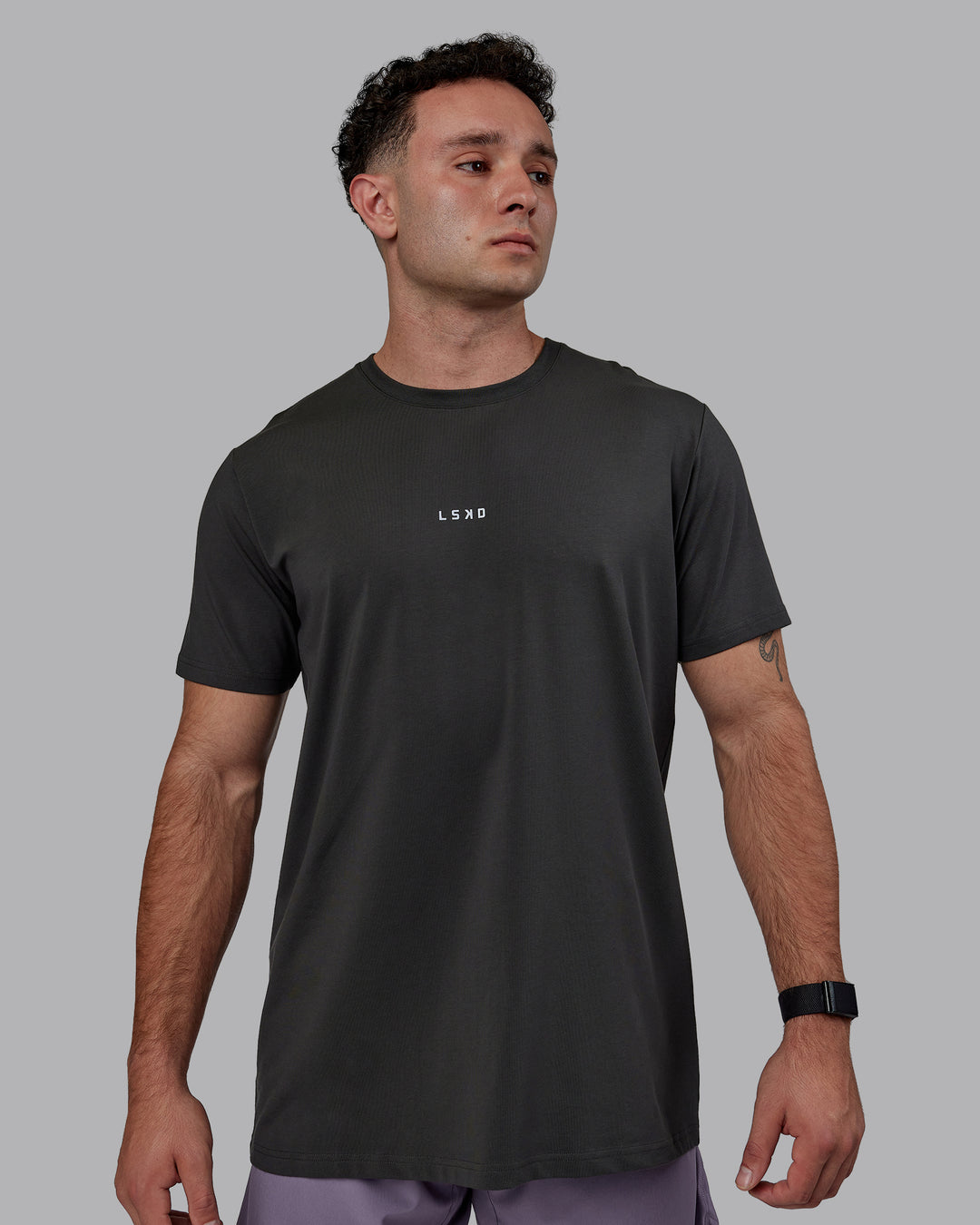 Man wearing Base FLXCotton Tee - Pirate Black