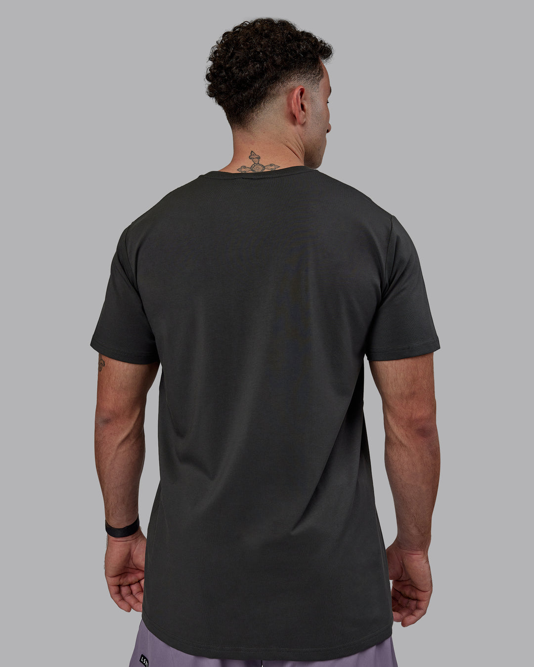 Man wearing Base FLXCotton Tee - Pirate Black