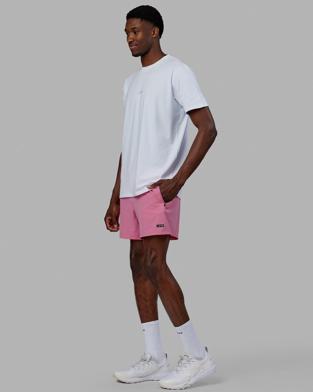 Man wearing Base FLXCotton Tee - White-Pink Rose