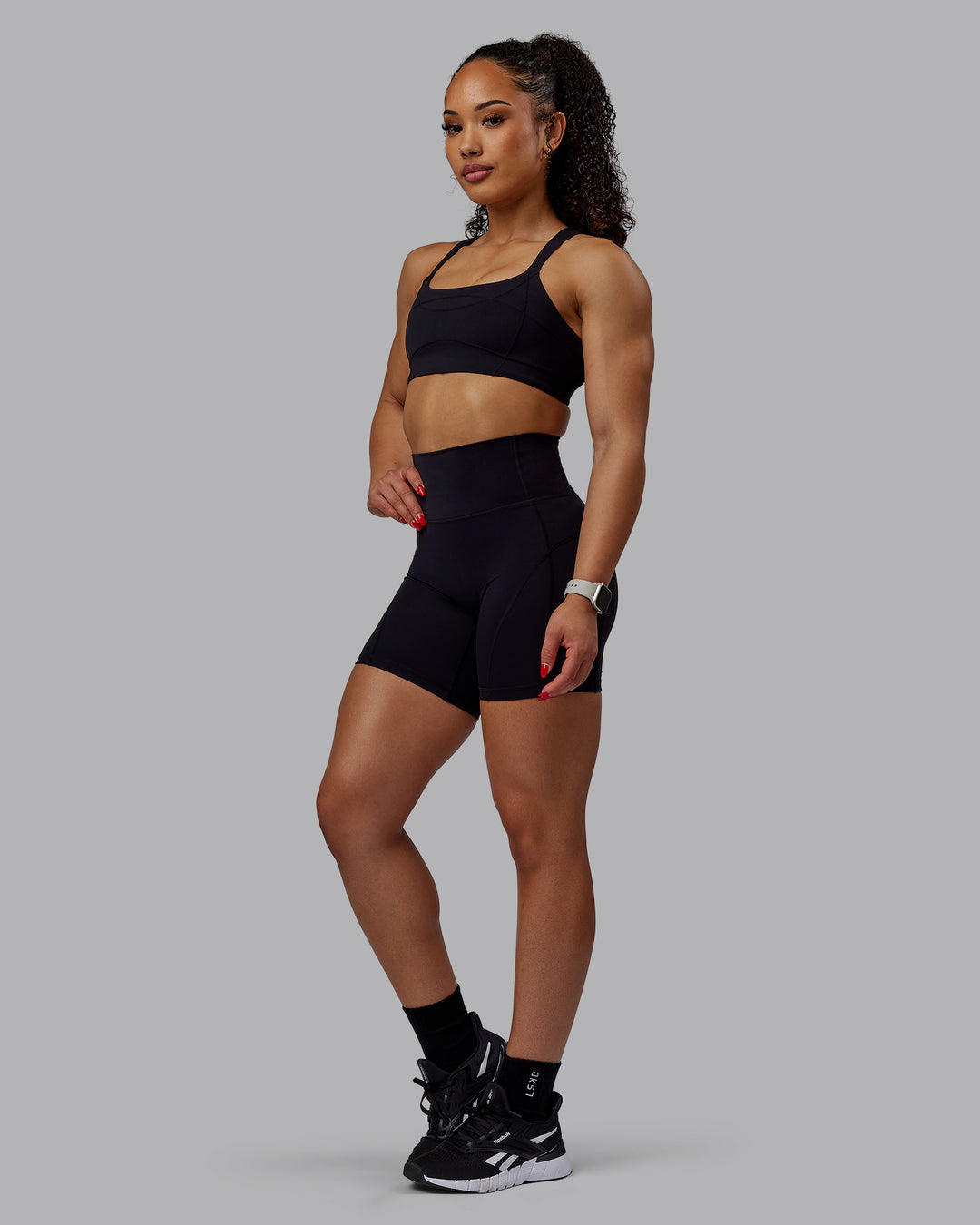 Woman wearing Bend Ultra High-Rise 6&quot; Short - Black