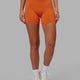 Woman wearing Bend Mid Short Tight - Burnt Orange