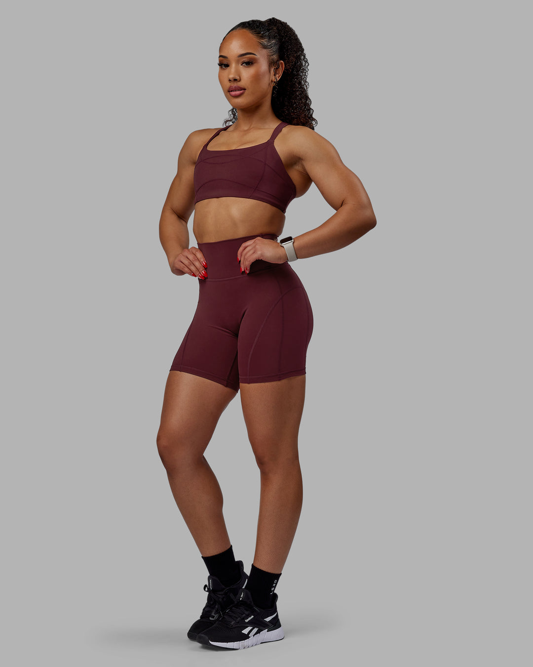 Woman wearing Bend Ultra High-Rise 6" Short - Dark Cherry