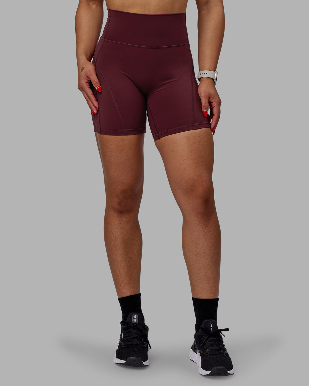 Woman wearing Bend Ultra High-Rise 6" Short - Dark Cherry
