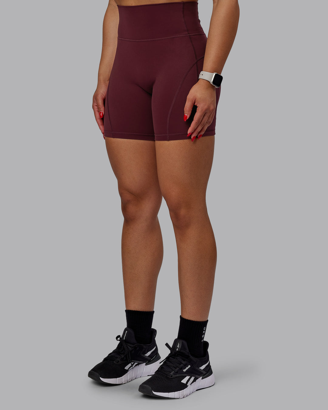 Woman wearing Bend Ultra High-Rise 6" Short - Dark Cherry
