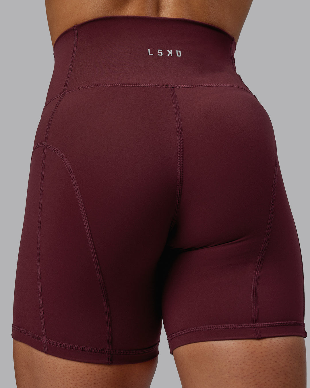 Woman wearing Bend Ultra High-Rise 6" Short - Dark Cherry