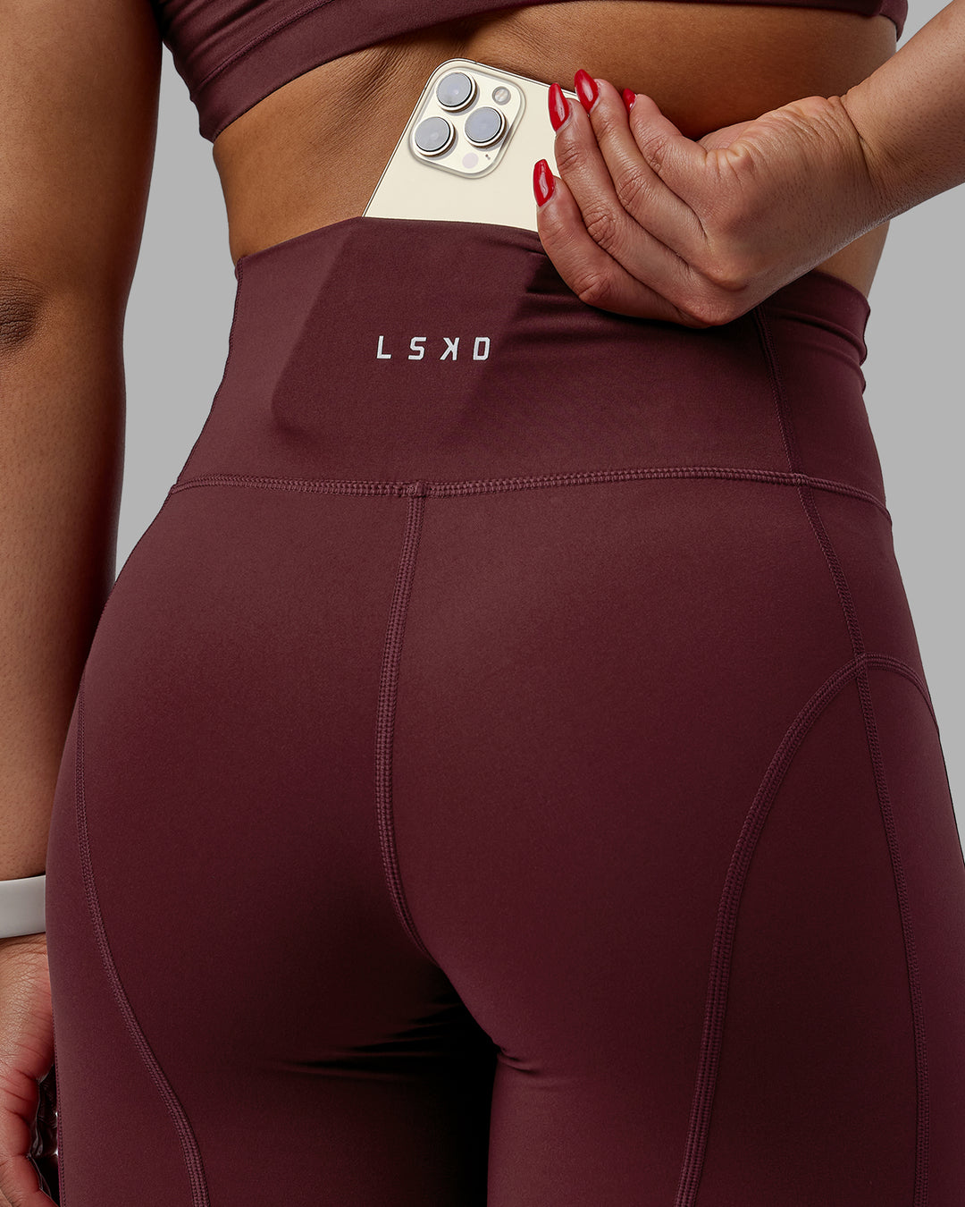 Woman wearing Bend Ultra High-Rise 6" Short - Dark Cherry