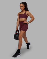 Woman wearing Bend Ultra High-Rise 6" Short - Dark Cherry