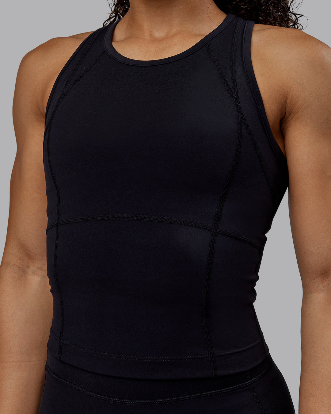 Woman wearing Bend Performance Tank - Black