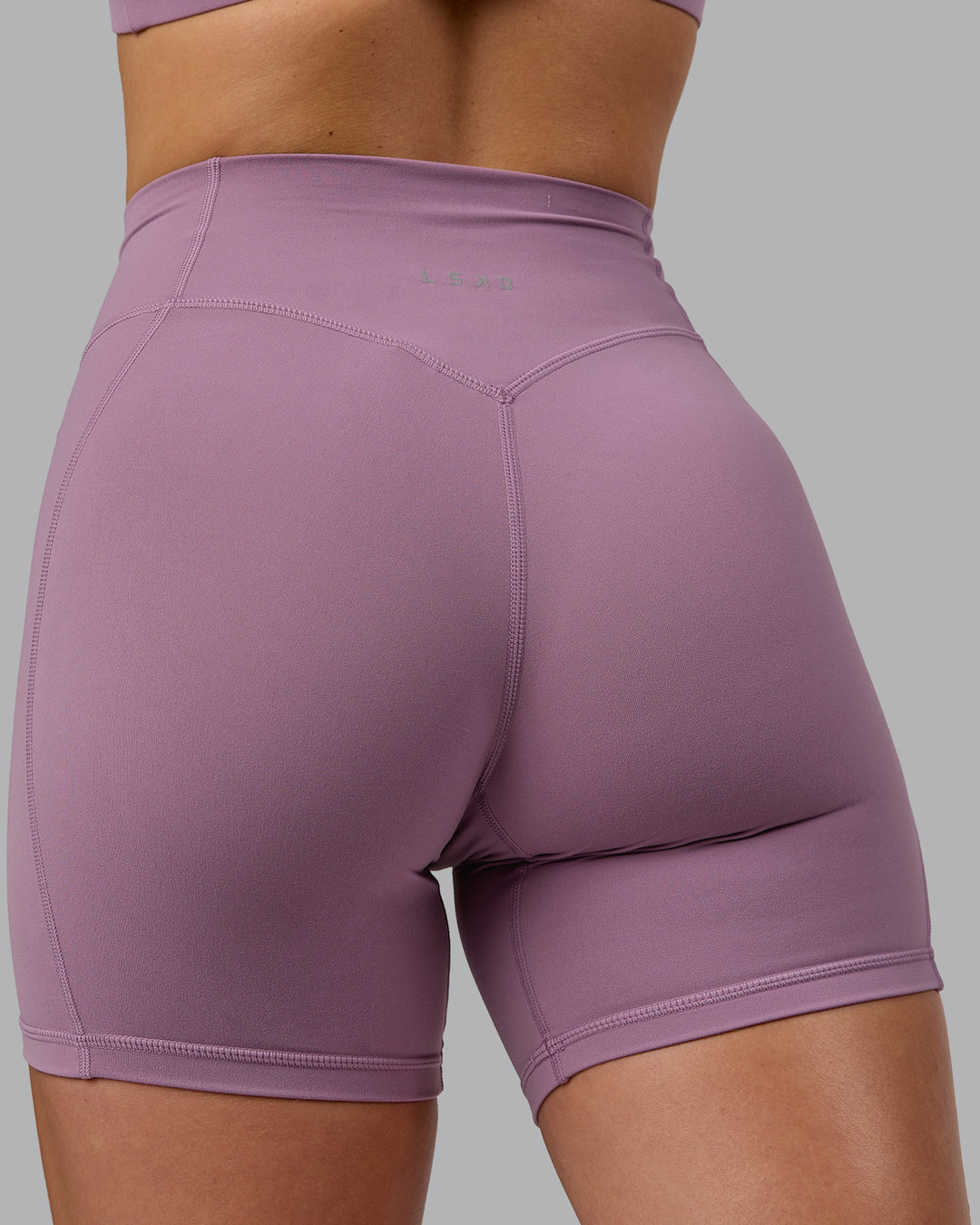 Woman wearing Blaze Ultra High-Rise 6&quot; Short - Grape