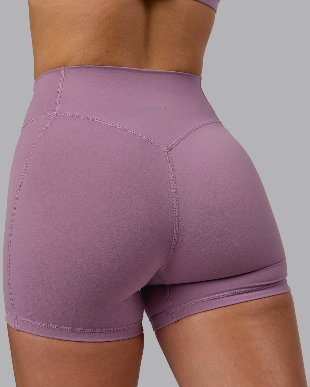 Woman wearing Blaze Ultra High-Rise 4&quot; Short - Grape