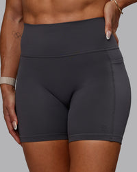 Woman wearing Bree Masters Fusion Ultra High-Rise 6" Short Pockets - Stormy