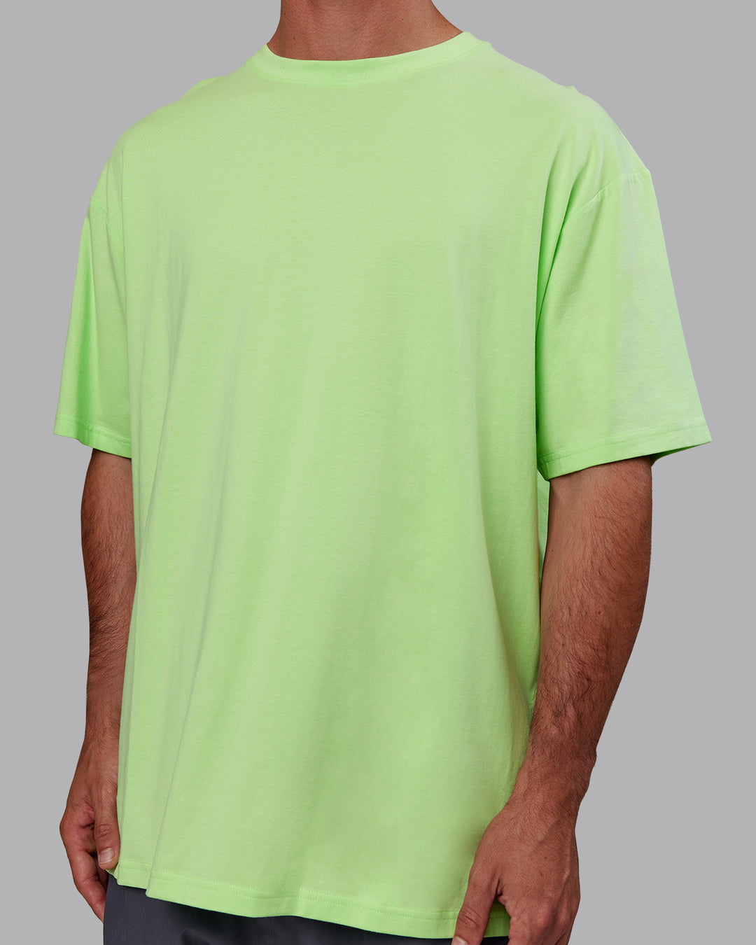 Man wearing Bree Masters Unisex Vision FLXCotton Tee Oversize - Pastel Lime-Stormy
