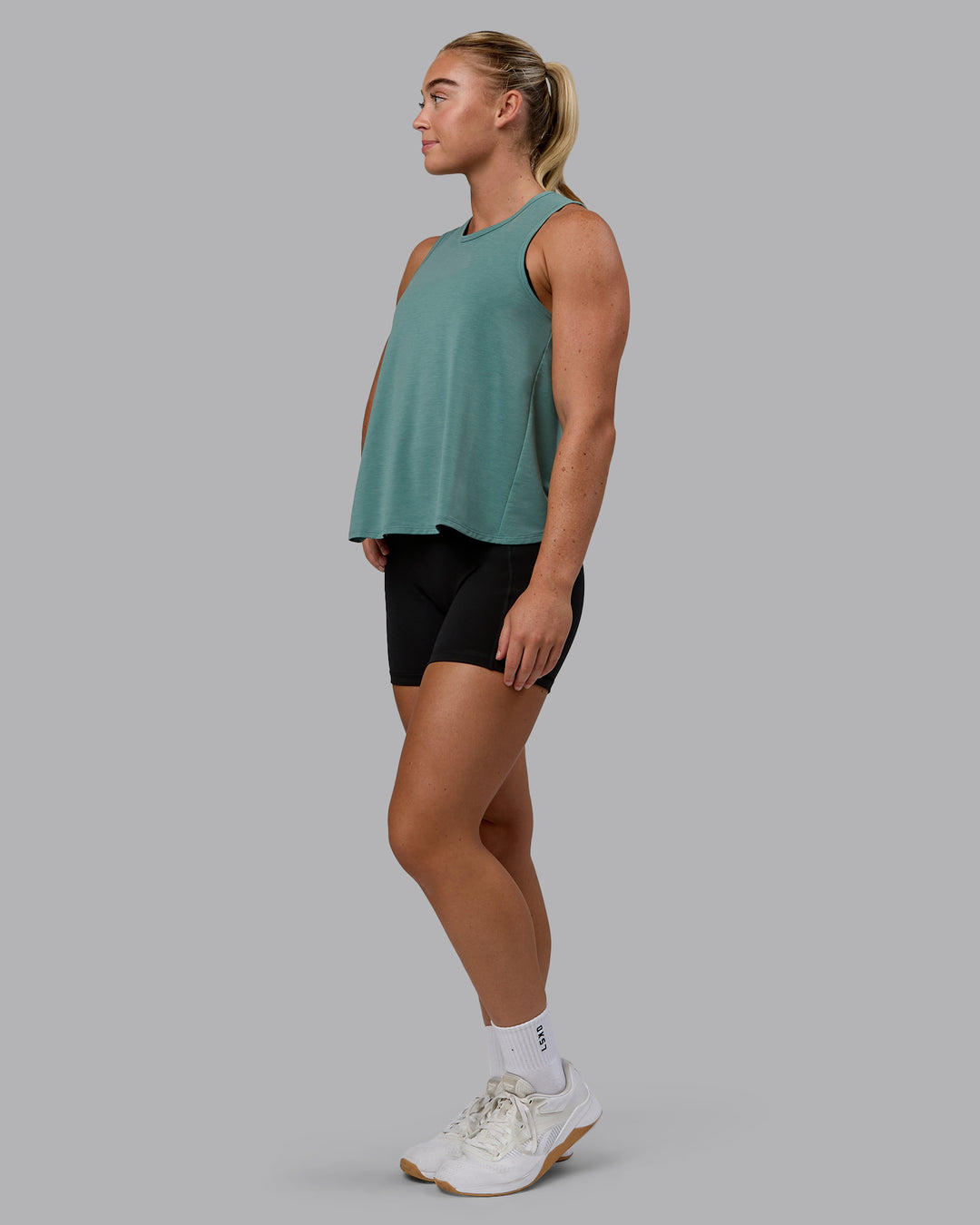 Woman wearing Breeze Training Tank - Sagebrush