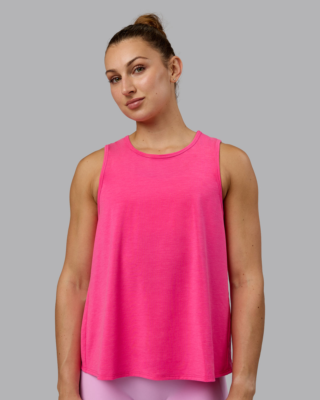 Woman wearing Breeze Training Tank - Ultra Pink - view 3