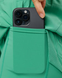 Woman wearing Challenger 5" Lined Performance Shorts - Mystic Green