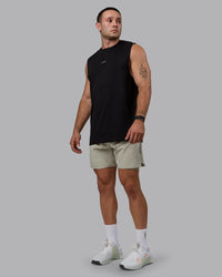Man wearing Challenger 6" Lined Performance Shorts - Sustained Grey