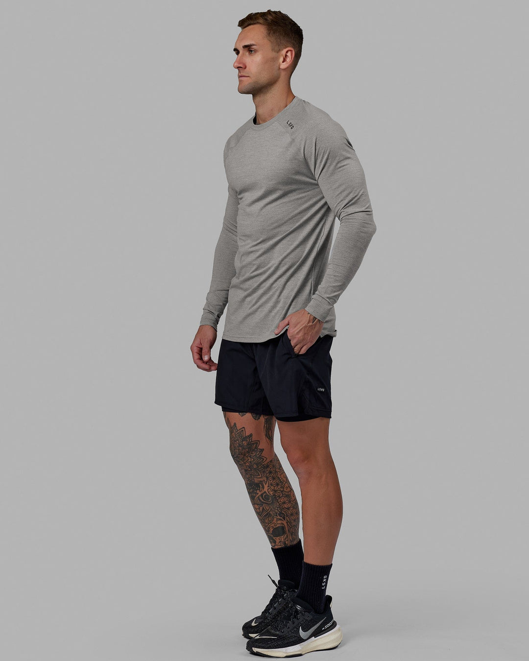 Man wearing Challenger 6&quot; Lined Performance Short - Black