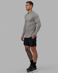 Man wearing Challenger 6" Lined Performance Short - Black