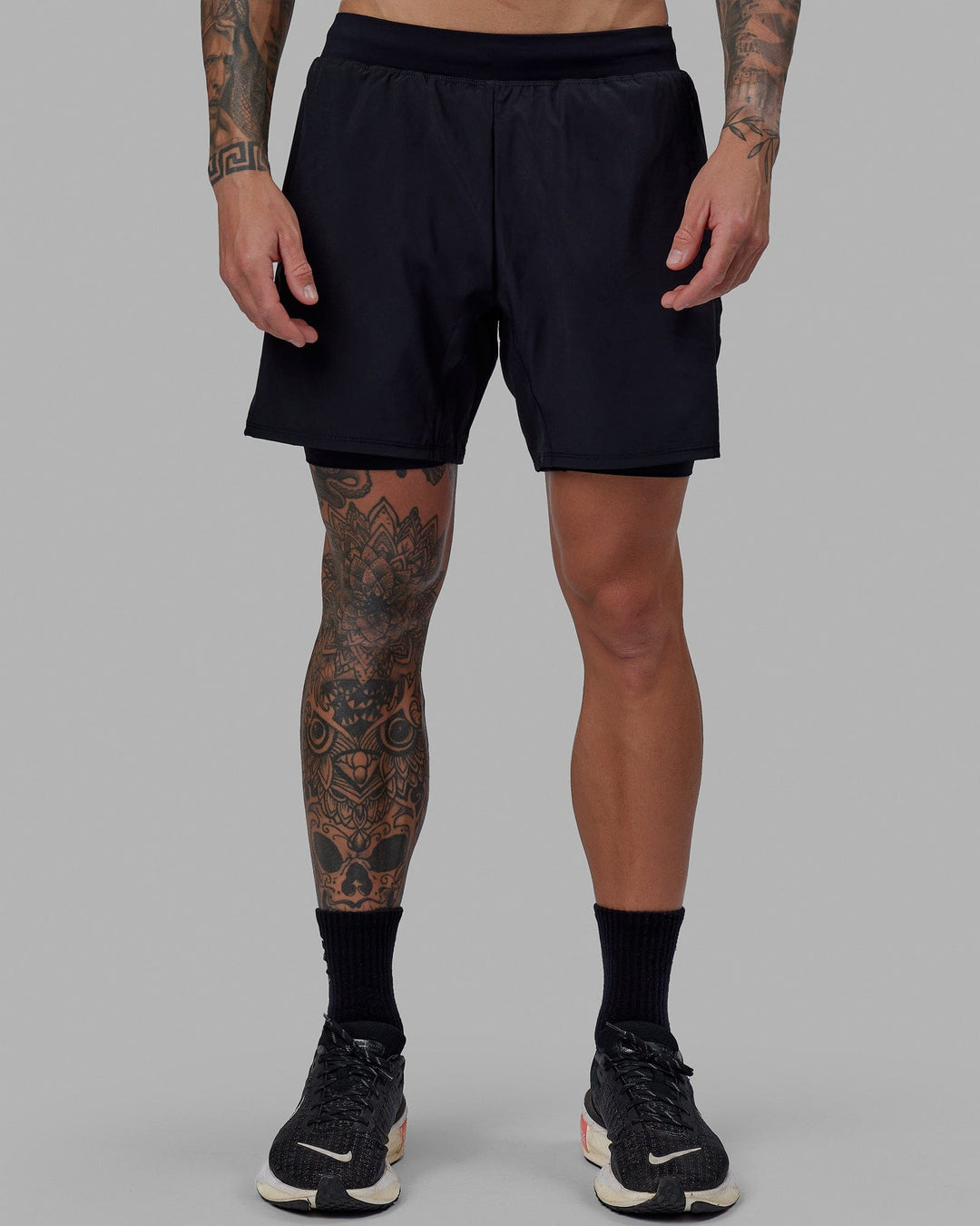 Man wearing Challenger 6&quot; Lined Performance Short - Black