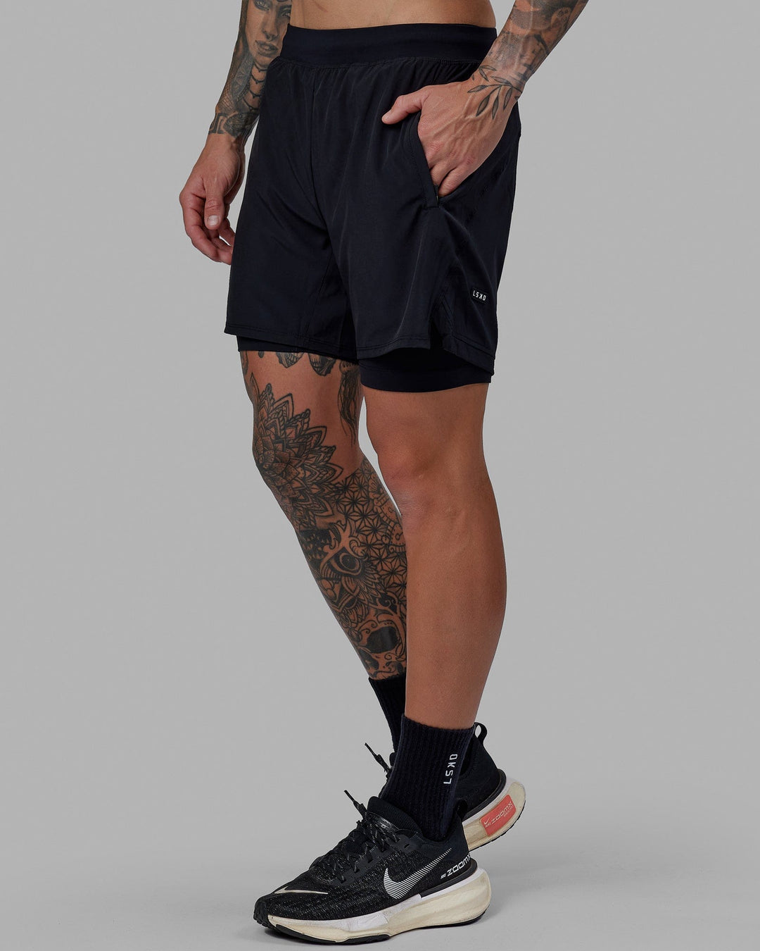 Man wearing Challenger 6&quot; Lined Performance Short - Black