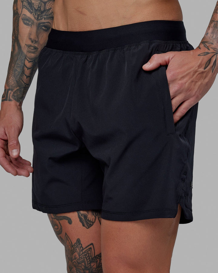 Man wearing Challenger 6" Performance Short - Black