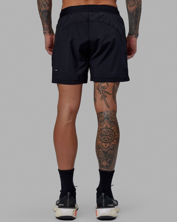 Man wearing Challenger 6" Performance Short - Black