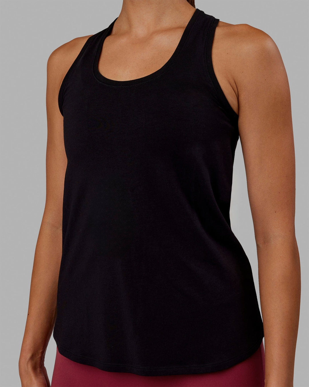 Woman wearing Charge PimaFLX-Lite Active Tank - Black