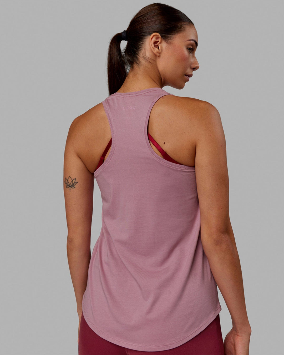 Woman wearing Charge PimaFLX-Lite Active Tank - Cosmetic Pink