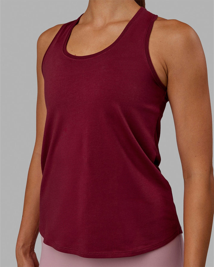 Woman wearing Charge PimaFLX-Lite Active Tank - Cranberry