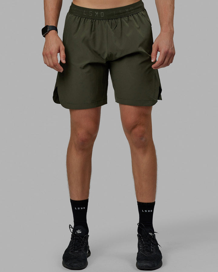 Man wearing Competition 8" Performance Short - Forest Night