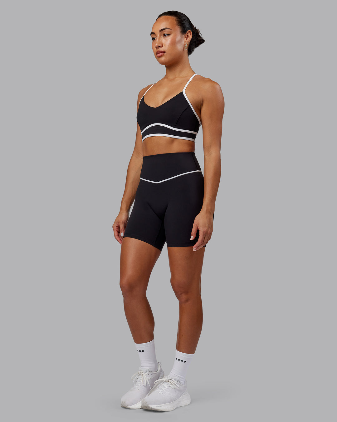 Woman wearing Contrast Ultra High-Rise 6&quot; Short - Black-White