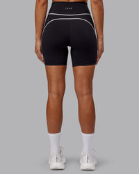 Woman wearing Contrast Ultra High-Rise 6" Short - Black-White