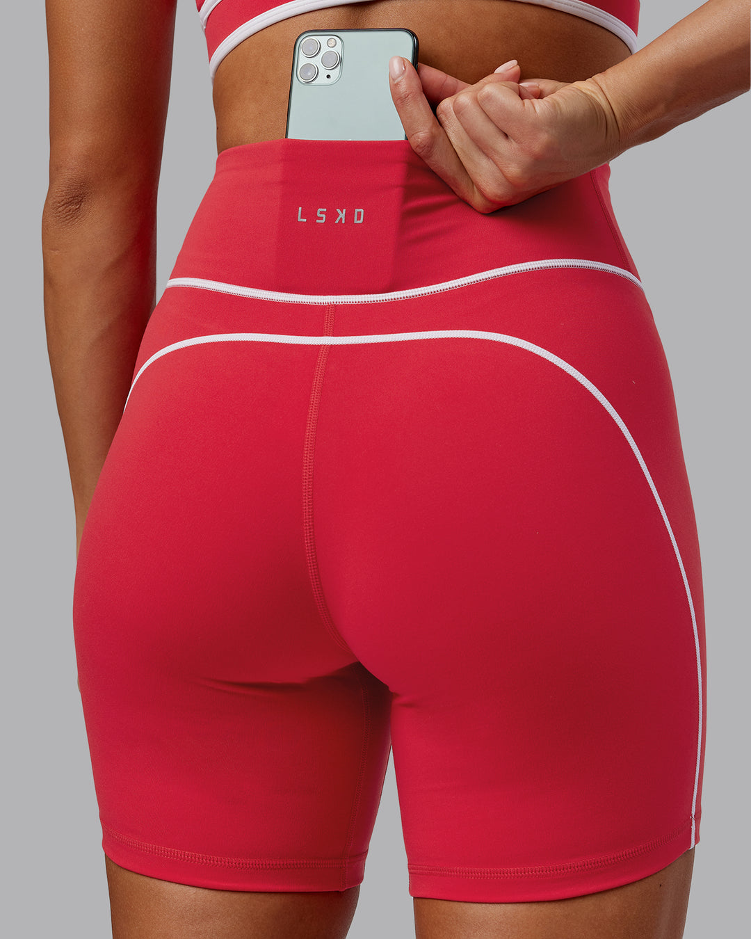 Woman wearing Contrast Ultra High-Rise 6&quot; Short - Scarlet-White
