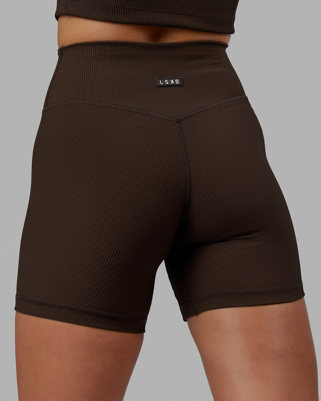 Woman wearing Creator Ribbed Mid Shorts - Dark Chocolate