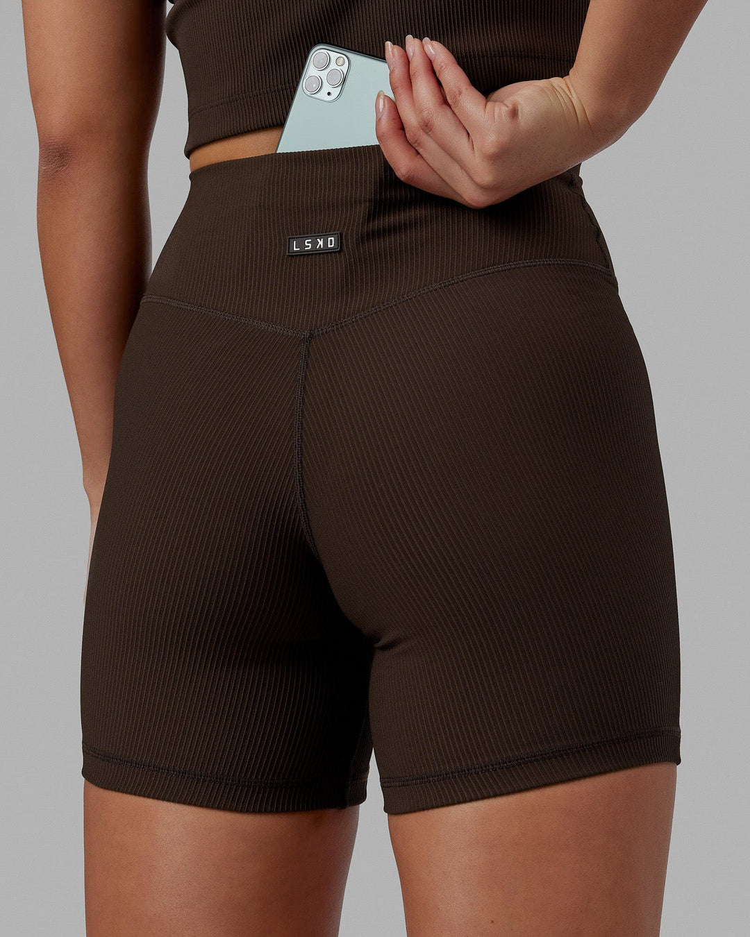 Woman wearing Creator Ribbed Mid Shorts - Dark Chocolate