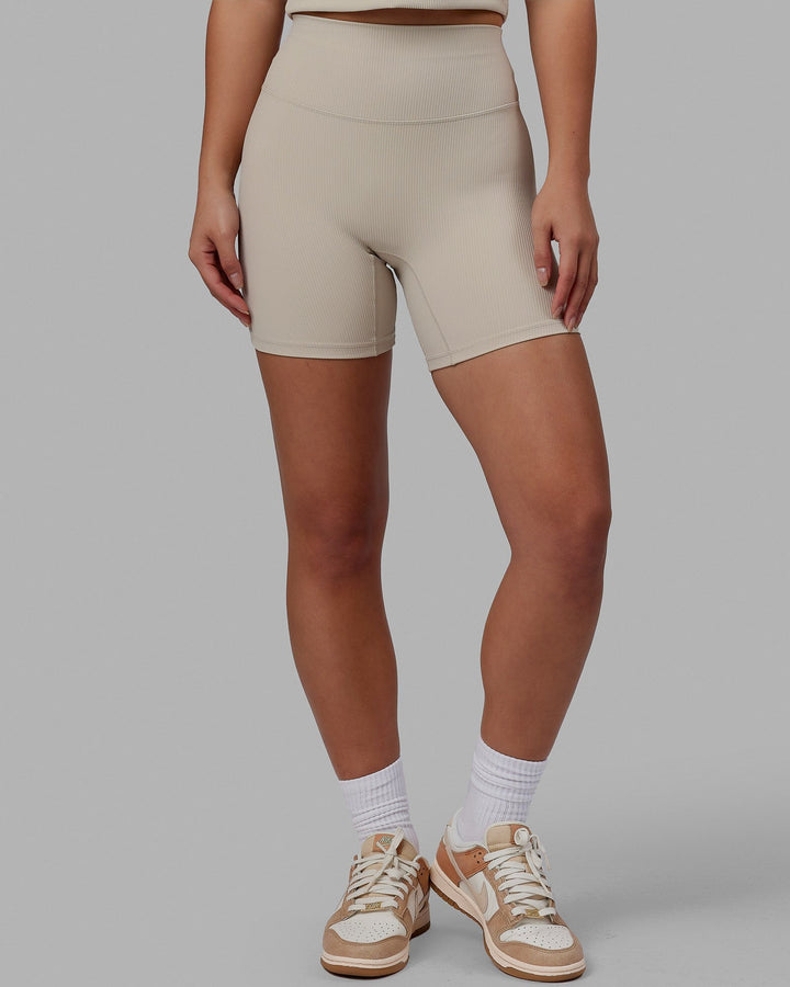 Woman wearing Creator Ribbed Mid Short Tights - Shale Beige