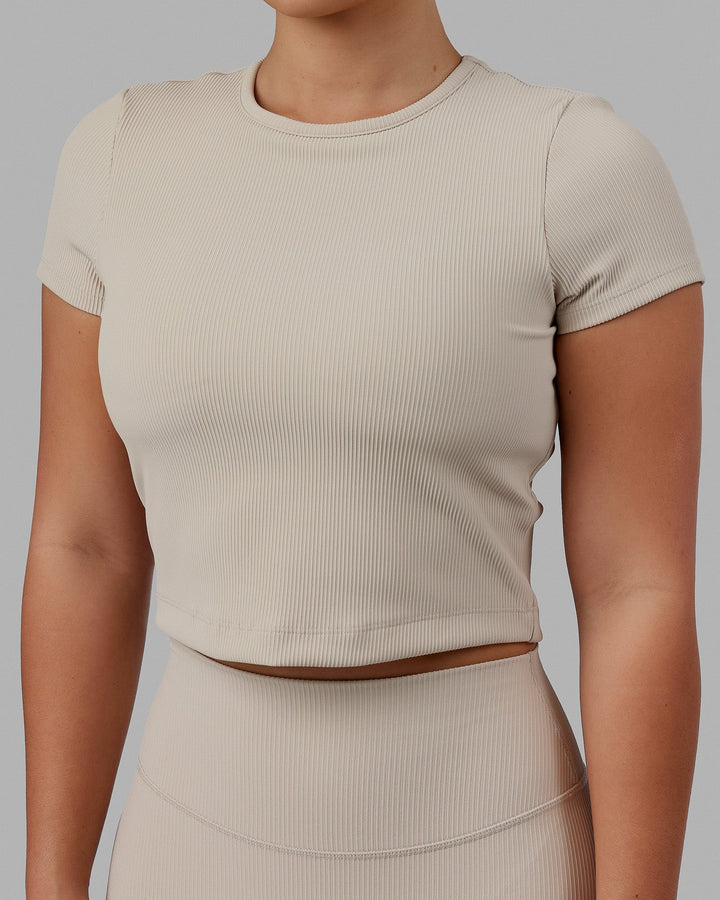 Woman wearing Creator Ribbed Tee - Shale Beige