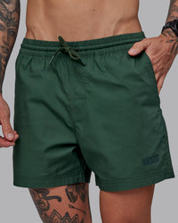 Man wearing Daily 5" Shorts - Cilantro