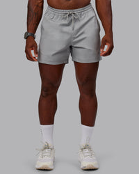 Man wearing Daily 5" Shorts - Circular Grey