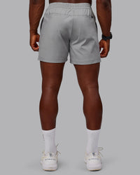 Man wearing Daily 5" Shorts - Circular Grey