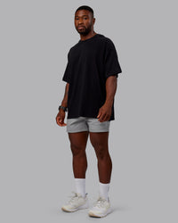 Man wearing Daily 5" Shorts - Circular Grey