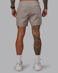 Man wearing Daily 5" Shorts - Shale Beige