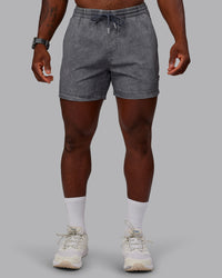 Man wearing Washed Daily 5" Shorts - Circular Grey