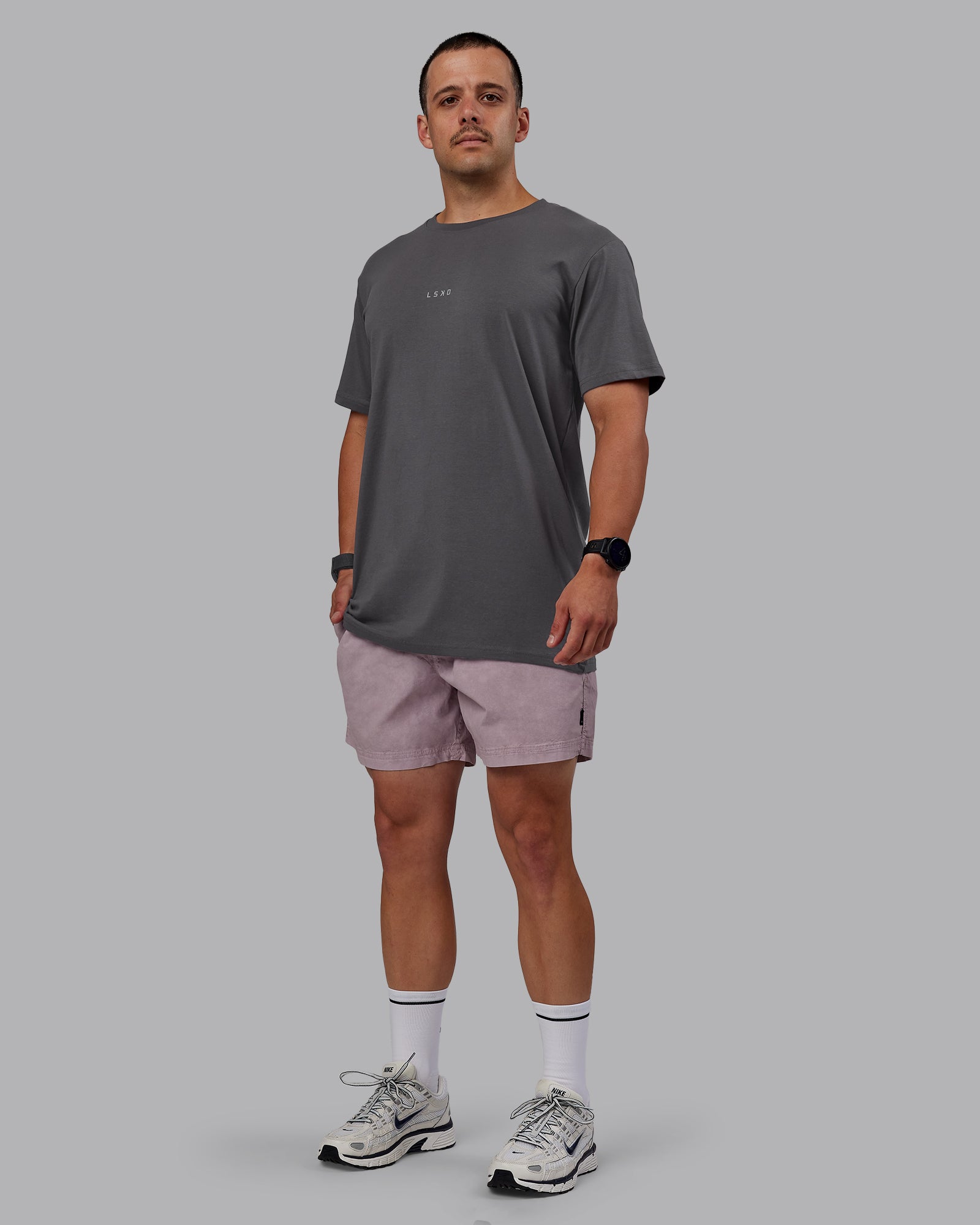 Man wearing Washed Daily 5" Shorts - Greyish Purple