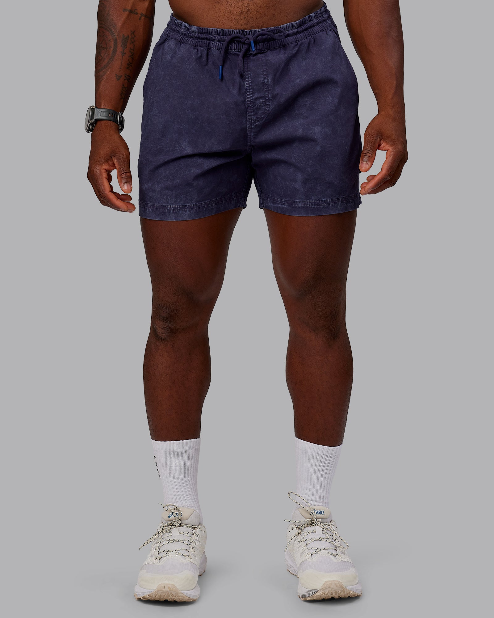 Man wearing Washed Daily 5" Shorts - Midnight Blue