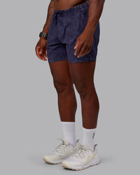 Man wearing Washed Daily 5" Shorts - Midnight Blue