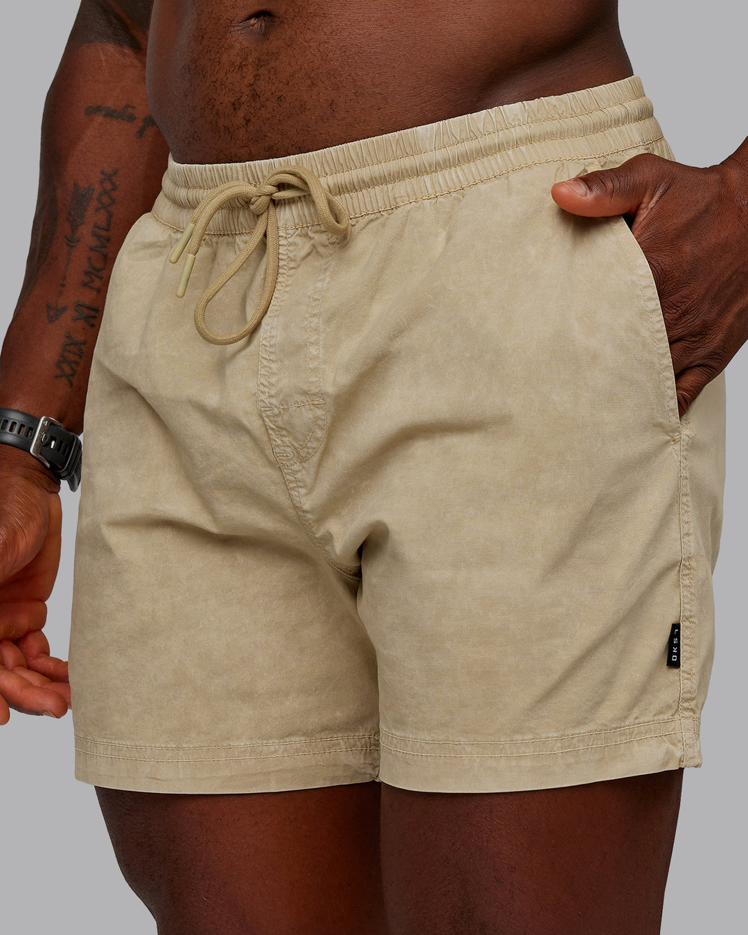 Man wearing Washed Daily 5&quot; Shorts - Pale Khaki