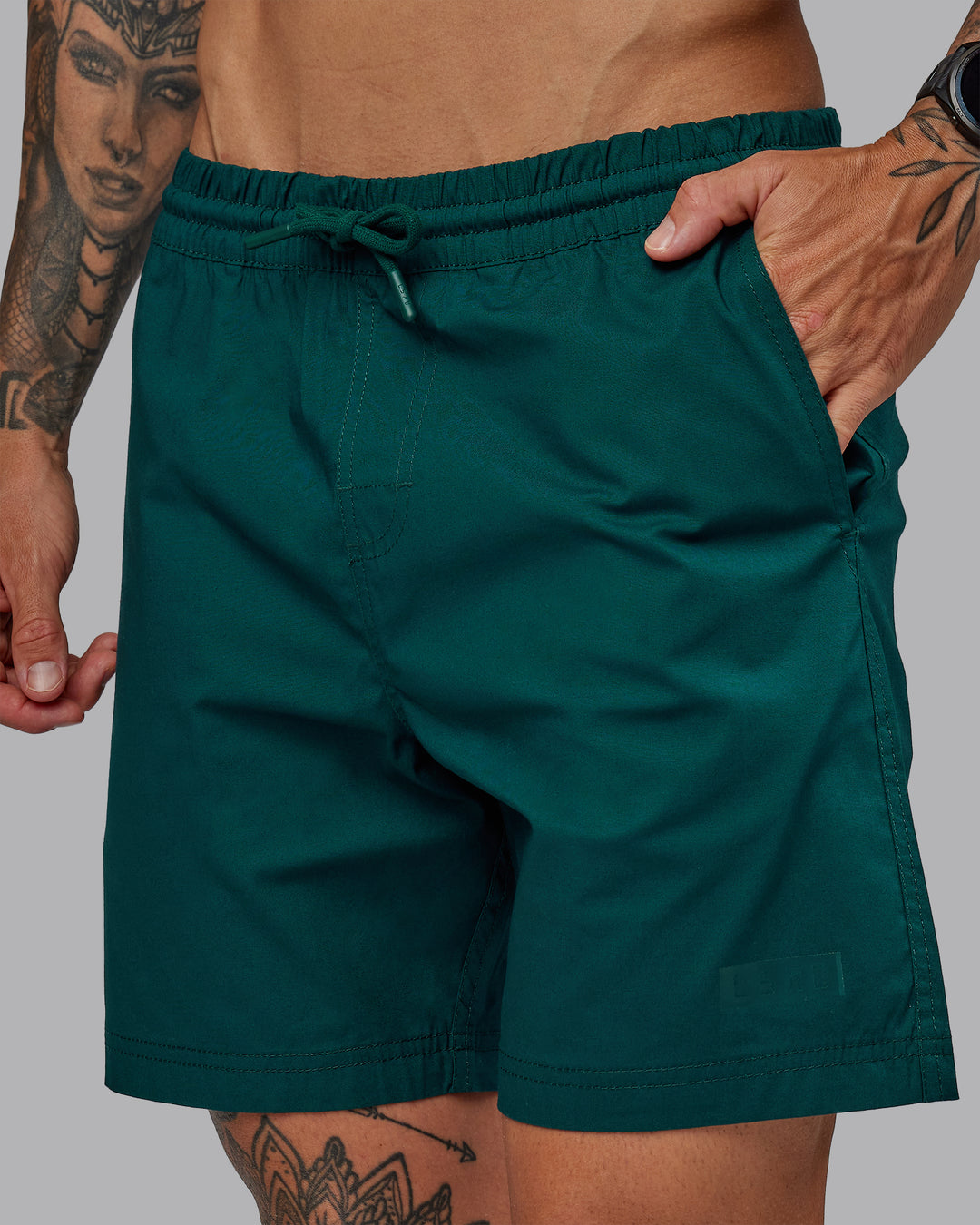 Man wearing Daily 7&quot; Shorts - Dark Moss